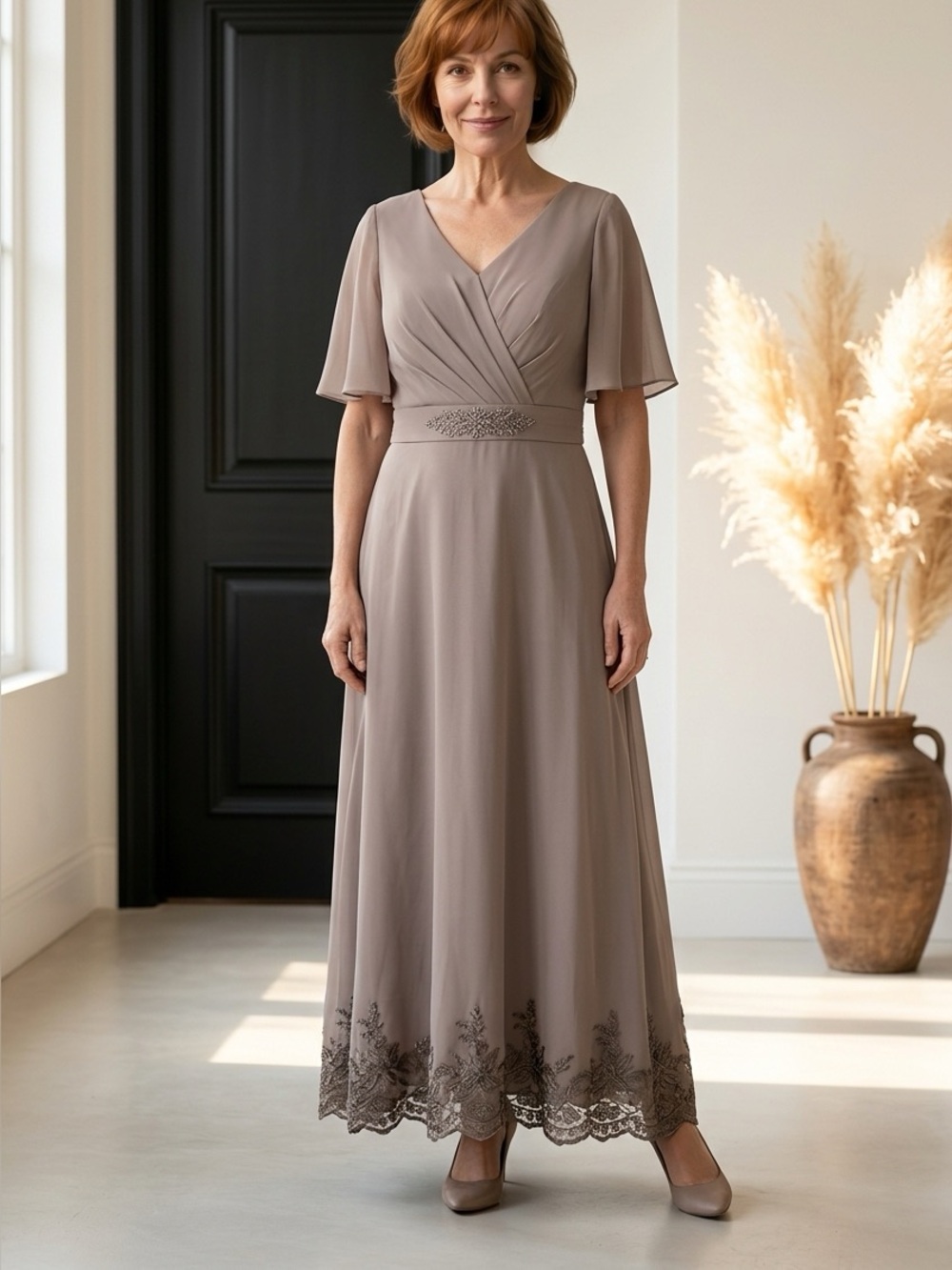 Elegant Taupe V-Neck Dress with Waist Detail and Embroidered Hem